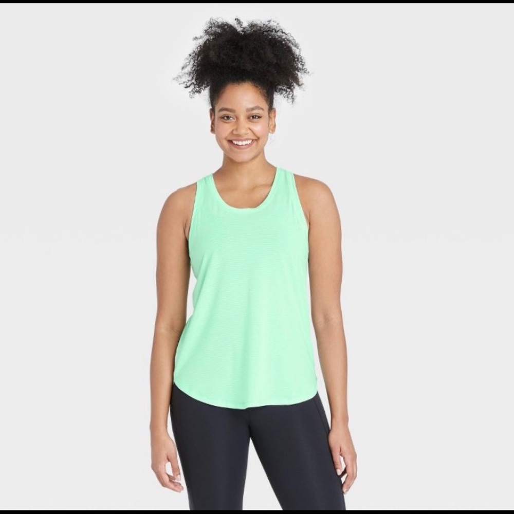 All In Motion Tanks - Lot of 4 size medium.